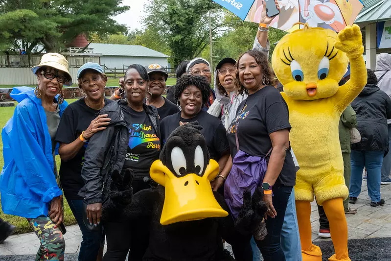 Senior Picnic Group Photo with Six Flags America Characters