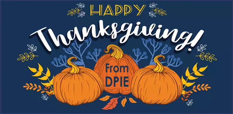 Happy Thanksgiving from DPIE, words with 3 pumpkins on blue background