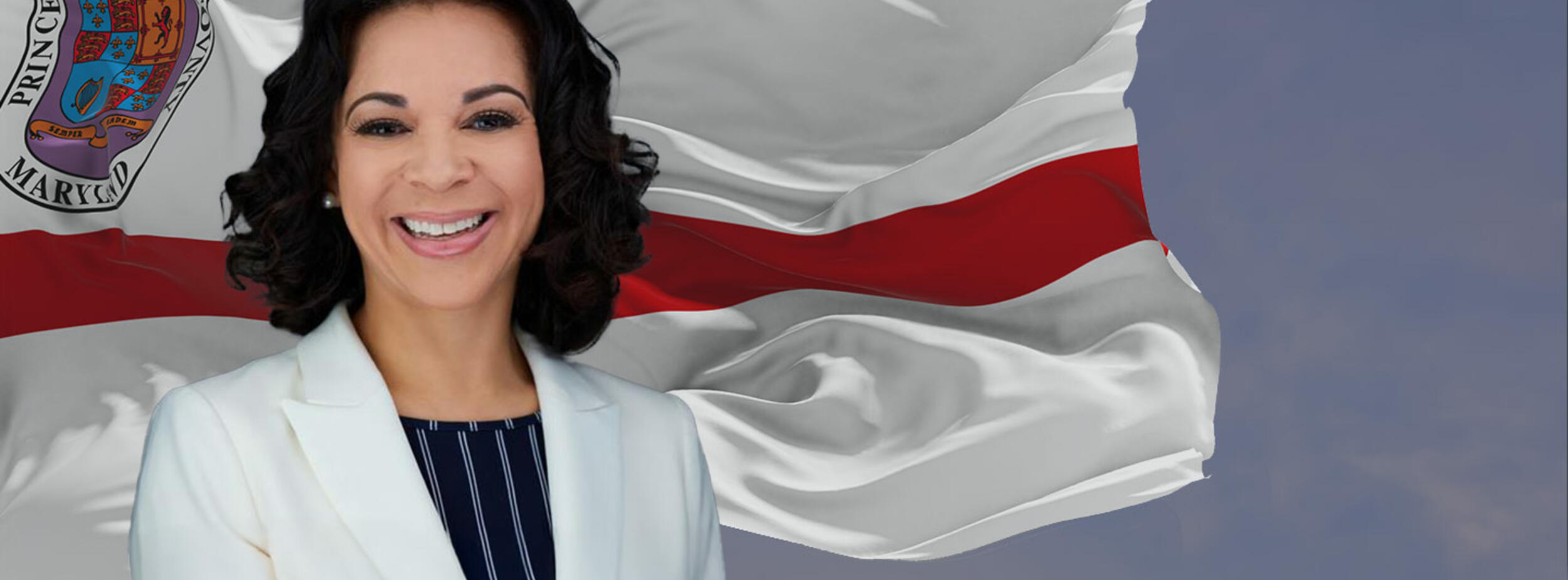 Acting County Executive Tara Jackson in front of the Prince George's County flag